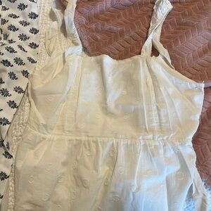 White Sleeveless Top with Textured Pattern
